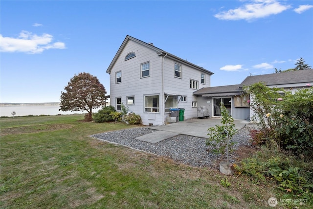 4412 Dyes Inlet Rd NW, Bremerton, WA 98312 - rear view of house with a patio and a lawn