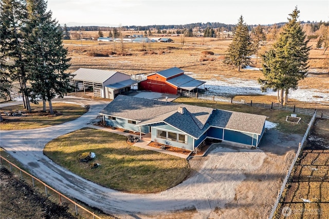 birds eye view of property featuring a rural view