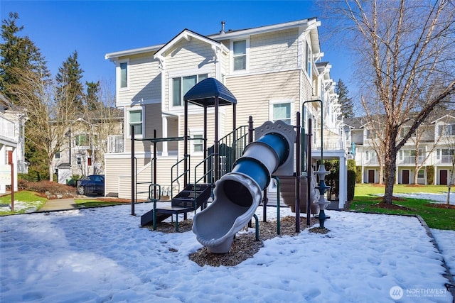 view of snow covered playground