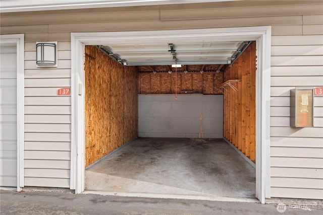 garage with wood walls