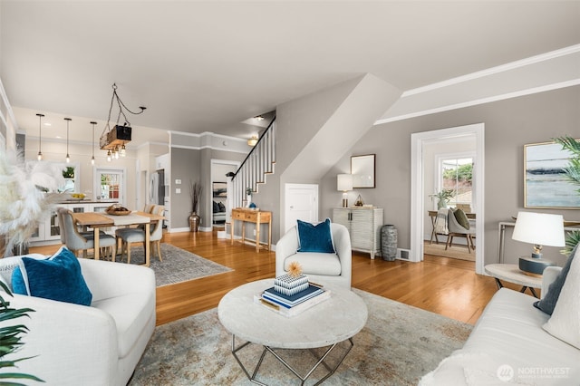 living room with light hardwood / wood-style flooring