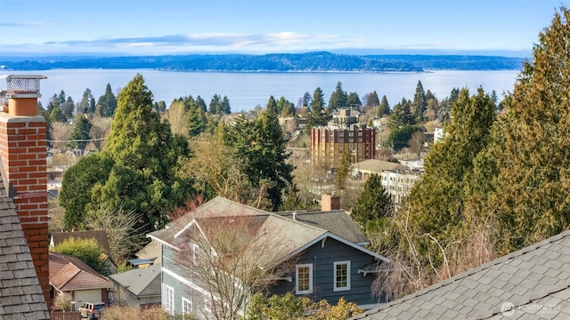 bird's eye view with a water and mountain view