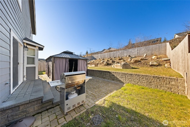 view of yard with a gazebo and a patio area