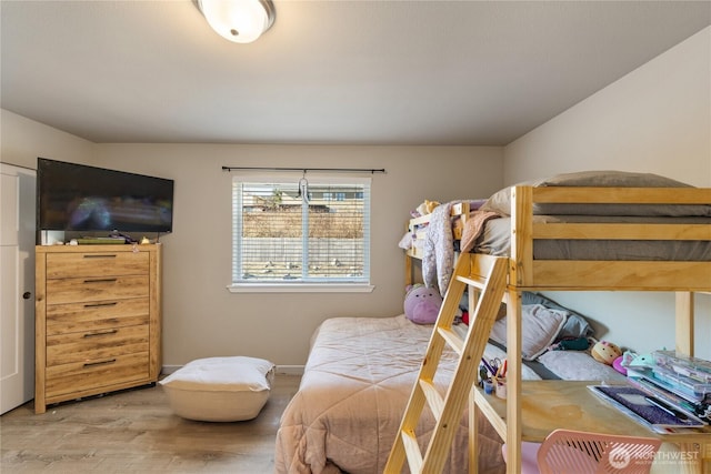 bedroom featuring hardwood / wood-style floors