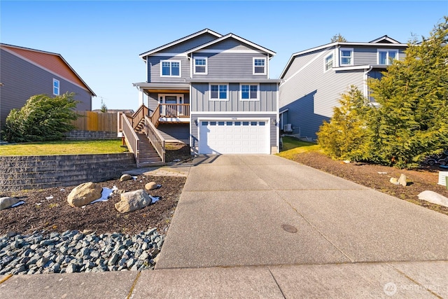 view of front of house with a garage and covered porch