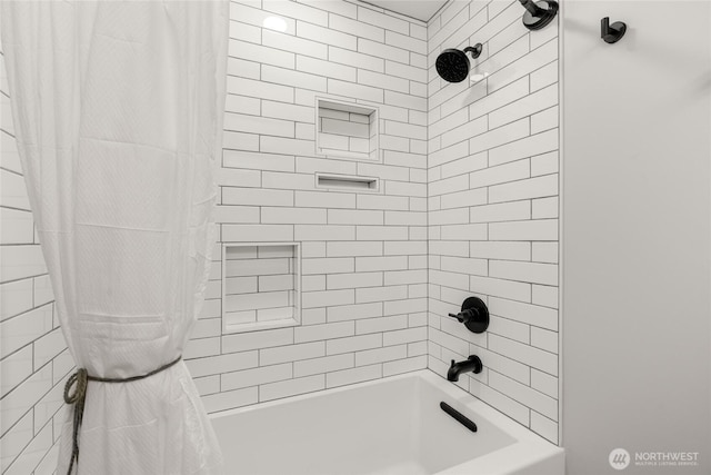 bathroom with shower / bath combination with curtain