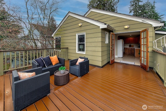 deck with an outdoor hangout area