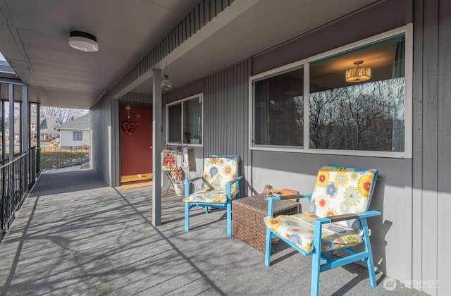 wooden deck featuring covered porch