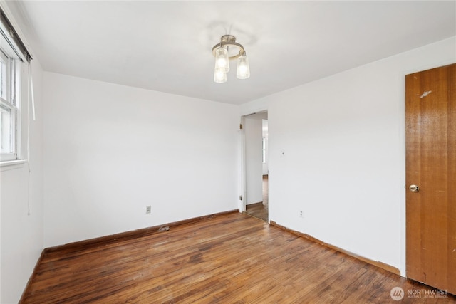 empty room featuring hardwood / wood-style floors