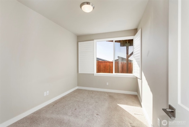 view of carpeted spare room