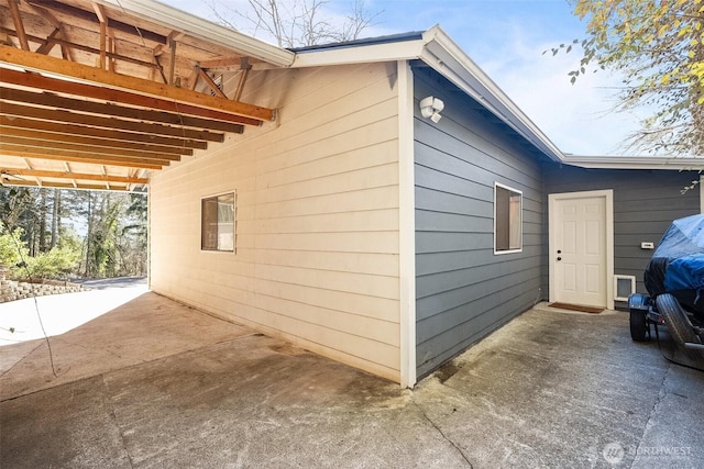 view of home's exterior featuring a patio