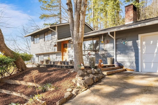 view of front of property with a garage