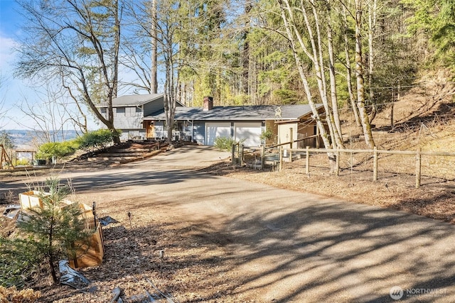 view of front of home with a garage