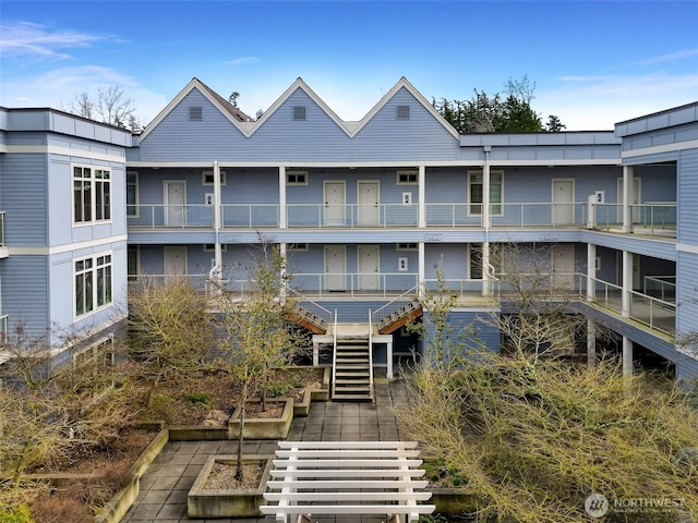 view of property with stairs