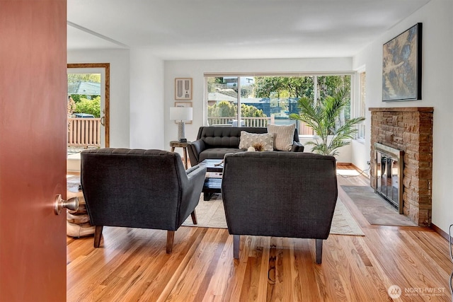 living room with light hardwood / wood-style flooring