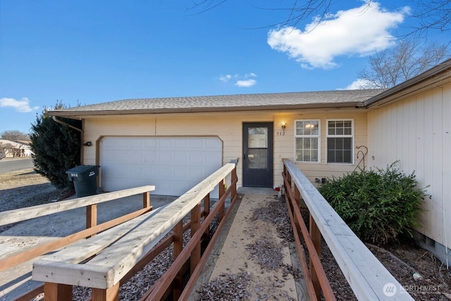 exterior space with a garage