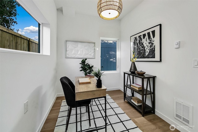 living area featuring dark hardwood / wood-style flooring