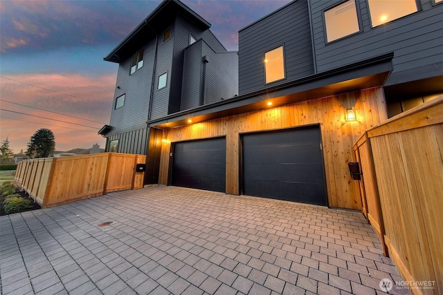 view of front of home with a garage