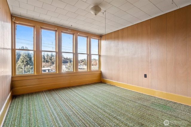 unfurnished sunroom with a healthy amount of sunlight