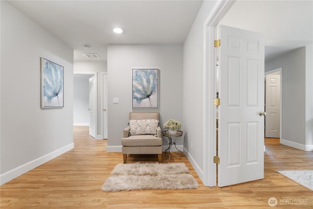 living area featuring hardwood / wood-style flooring