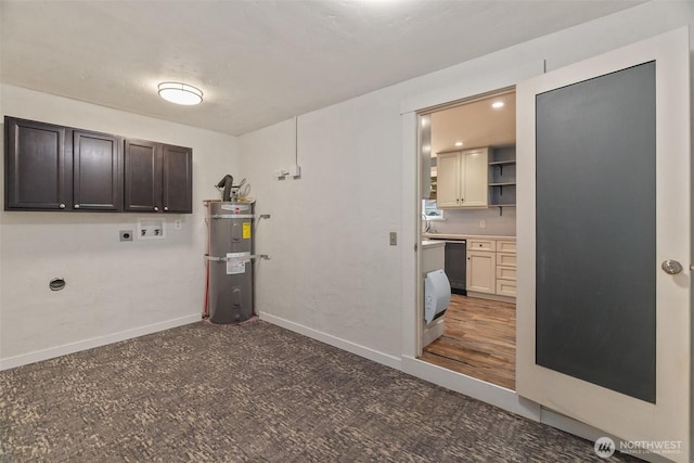 laundry area with electric dryer hookup, washer hookup, cabinet space, baseboards, and secured water heater