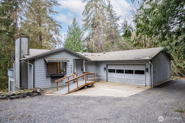 single story home featuring a garage