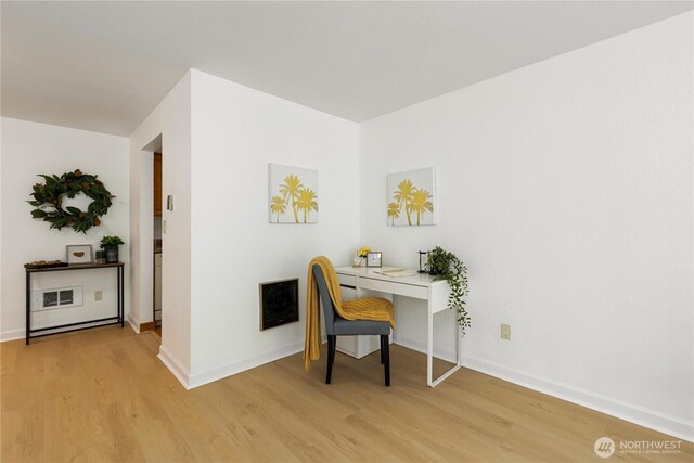 3710 25th Pl W Unit 401, Seattle, WA 98199 - office area featuring light wood-style flooring and baseboards