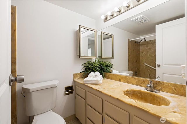3710 25th Pl W Unit 401, Seattle, WA 98199 - full bathroom featuring toilet, vanity, and a shower