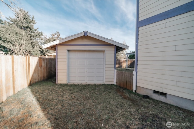 garage with a lawn