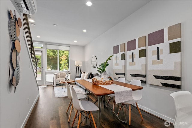 dining room with dark hardwood / wood-style flooring