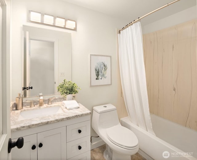 full bathroom featuring vanity, toilet, and shower / bath combination with curtain