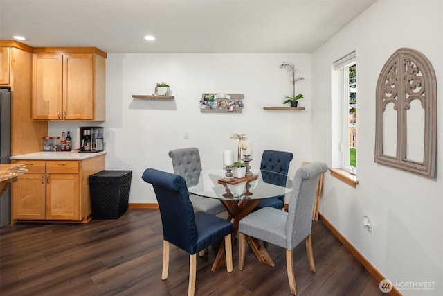 dining room with recessed lighting, dark wood-style flooring, and baseboards