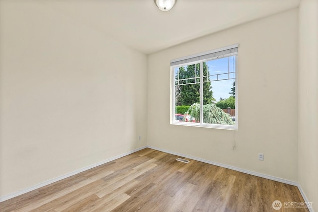 5401 Parkside Dr SE, Lacey, WA 98503 - empty room featuring light wood-type flooring and baseboards