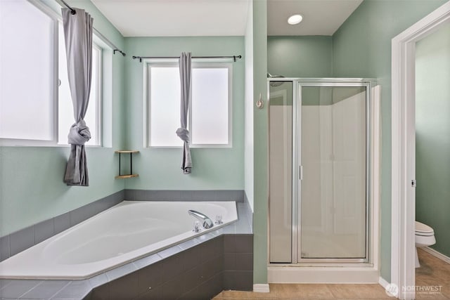 5401 Parkside Dr SE, Lacey, WA 98503 - bathroom featuring a stall shower, a bath, and healthy amount of natural light