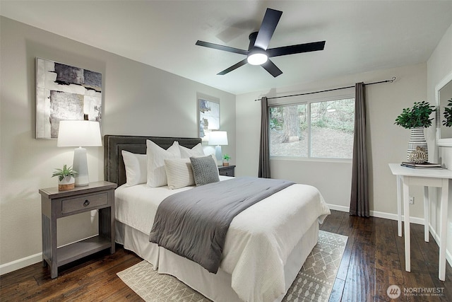 bedroom with dark hardwood / wood-style floors and ceiling fan