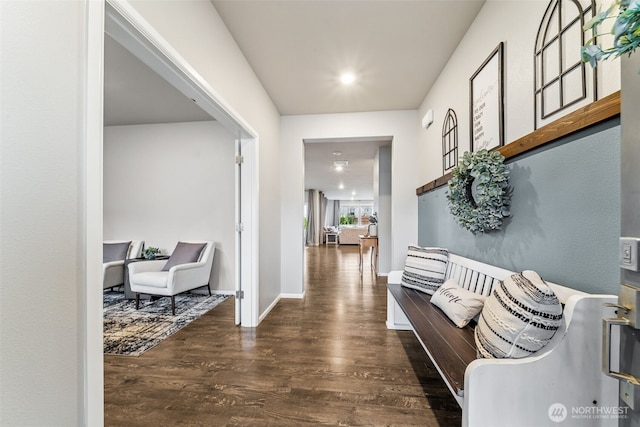 hall with dark wood-type flooring