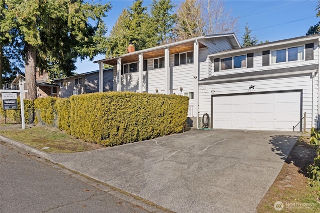 view of front of property featuring a garage