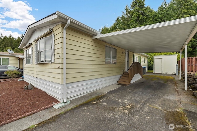 view of front of house featuring a carport