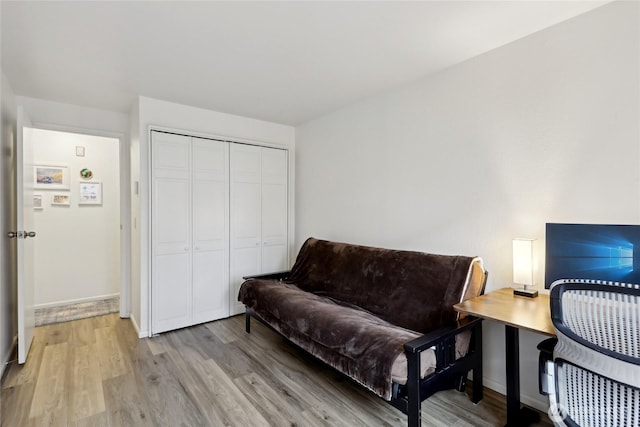 sitting room featuring light wood finished floors