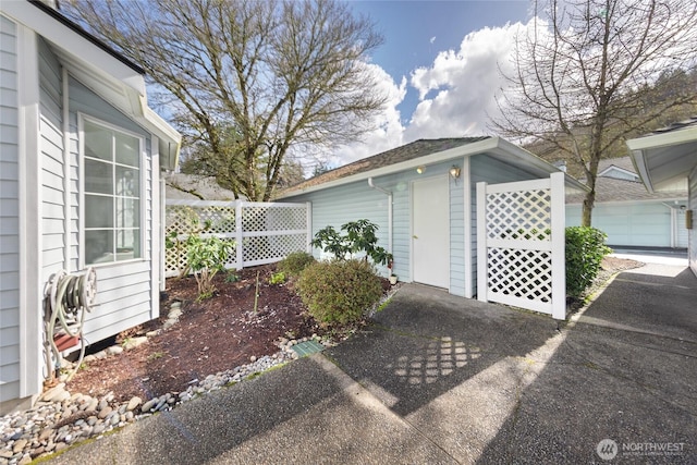 garage featuring fence