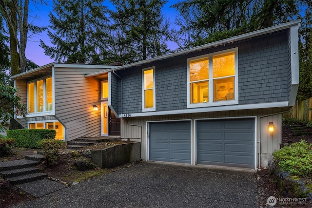 view of front of house featuring driveway and an attached garage