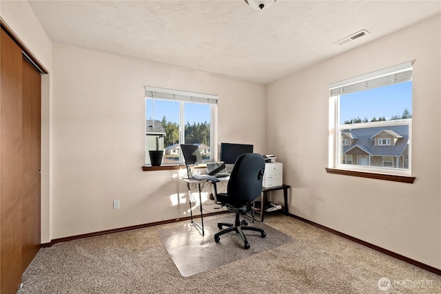 view of carpeted home office