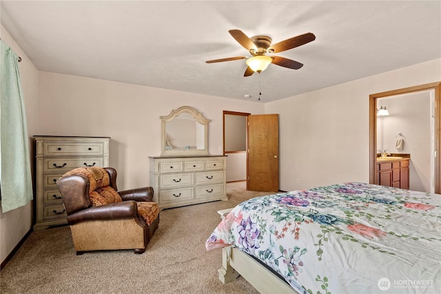 bedroom with ceiling fan, light colored carpet, and sink