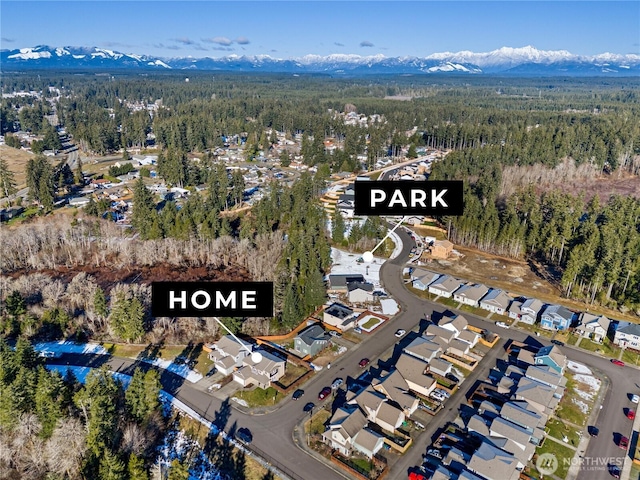 aerial view featuring a mountain view