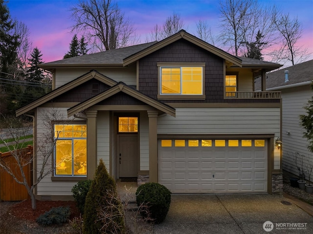 view of front of property with a garage