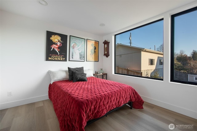 bedroom featuring wood-type flooring