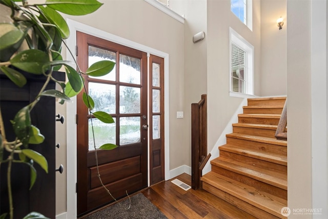 entrance foyer with dark wood-type flooring