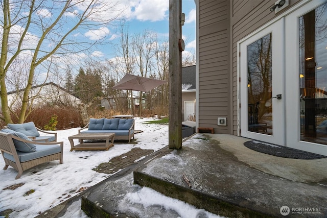 view of snow covered patio