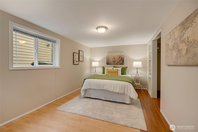 bedroom featuring hardwood / wood-style flooring