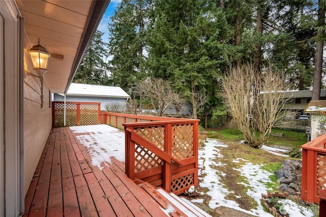 view of snow covered deck